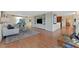 Spacious living room featuring hardwood floors, custom built-ins, and an open layout at 3111 Bel Air Dr # 7D, Las Vegas, NV 89109