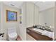 Elegant powder room with modern fixtures, floating vanity and stylish decor at 3111 Bel Air Dr # 7D, Las Vegas, NV 89109