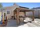 Backyard featuring a gazebo with dining table and chairs set, along with a Everlast punching bag at 4136 Broadriver Dr, Las Vegas, NV 89108