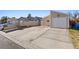 A charming single-story home with a two-car garage and spacious concrete driveway at 4136 Broadriver Dr, Las Vegas, NV 89108