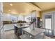 Modern kitchen featuring granite countertops, stainless steel appliances, and white cabinetry at 4136 Broadriver Dr, Las Vegas, NV 89108