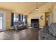 A cozy living room with hardwood floors and contemporary furnishings at 4136 Broadriver Dr, Las Vegas, NV 89108