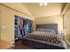 Main bedroom with a large closet and king bed, perfect for rest and relaxation at 4136 Broadriver Dr, Las Vegas, NV 89108