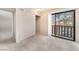 Bedroom featuring sliding glass doors and a closet at 4853 Rollingwood Cir, Las Vegas, NV 89121