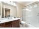 Bathroom featuring glass shower, modern vanity, and attractive tile flooring at 7029 Parrot Bay Way, Las Vegas, NV 89118