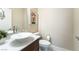 Well-lit powder room with modern vanity and stylish decor at 7029 Parrot Bay Way, Las Vegas, NV 89118