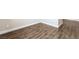 Wood-look flooring is carried throughout the home, providing a clean and modern look at 7029 Parrot Bay Way, Las Vegas, NV 89118