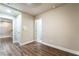Clean hallway with wood floors and neutral walls at 7029 Parrot Bay Way, Las Vegas, NV 89118