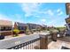 Beautiful street view of a neighborhood with well-maintained homes on a sunny day with a blue sky at 7029 Parrot Bay Way, Las Vegas, NV 89118