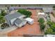 Spacious property with a house, multiple outbuildings and a large area for parking, landscaping or other uses at 7477 Ullom Dr, Las Vegas, NV 89139