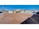 Extensive lot featuring a basketball court and covered patio at 7477 Ullom Dr, Las Vegas, NV 89139