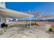View of covered patio with a clear blue sky at 7477 Ullom Dr, Las Vegas, NV 89139