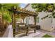 Backyard features a covered pergola with seating at 7788 Ebro Valley Ct, Las Vegas, NV 89113