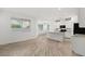 Spacious living area featuring tile flooring and seamless transition to the kitchen at 902 Earth Luster Rd, Las Vegas, NV 89178