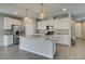 Well-equipped kitchen with large island, stainless steel appliances, and open layout at 9216 Verdugo Ridge Ct, Las Vegas, NV 89148