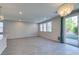 Spacious living room featuring an abundance of natural light and seamless indoor-outdoor flow at 9216 Verdugo Ridge Ct, Las Vegas, NV 89148