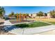 Community playground featuring a climbing structure, benches, and plenty of open space at 9216 Verdugo Ridge Ct, Las Vegas, NV 89148