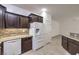 Gourmet kitchen boasts granite counters, stainless appliances, and ample cabinet space at 9517 Alma Ridge Ave, Las Vegas, NV 89178