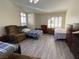 Spacious bedroom with hardwood floors, two beds, natural light, and ample closet space at , Las Vegas, NV 89110