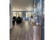 Bright living room featuring hardwood floors, plantation shutters, and stylish decor at , Las Vegas, NV 89110