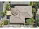 Aerial view of the home showing the unique roof, landscaping and outdoor features at 10057 Regency Canyon Way, Las Vegas, NV 89148