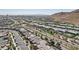 Neighborhood aerial view showcasing the landscaped streets, home exteriors, and overall community design at 10057 Regency Canyon Way, Las Vegas, NV 89148
