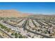 Panoramic aerial view displaying the community layout, streetscape, and desert landscape at 10057 Regency Canyon Way, Las Vegas, NV 89148