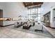 Spacious living room featuring high ceilings, stylish seating, and abundant natural light at 10057 Regency Canyon Way, Las Vegas, NV 89148