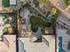 Aerial view of rear yard with landscaping, spa, and outdoor kitchen at 10179 Emerald Sunset Ct, Las Vegas, NV 89148