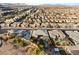 High aerial view of homes showcasing a pool and luxurious backyard landscaping at 10179 Emerald Sunset Ct, Las Vegas, NV 89148