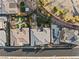 Aerial view of rear yard with landscaping, pool, spa, and outdoor kitchen at 10179 Emerald Sunset Ct, Las Vegas, NV 89148