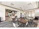 Spacious clubhouse area with tables, chairs, and partial kitchen; perfect for social gatherings at 10179 Emerald Sunset Ct, Las Vegas, NV 89148
