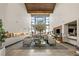 Bright clubhouse lounge featuring high ceilings and comfortable seating areas at 10179 Emerald Sunset Ct, Las Vegas, NV 89148