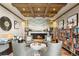 Cozy library with fireplace, built-in bookshelves, and comfortable seating at 10179 Emerald Sunset Ct, Las Vegas, NV 89148