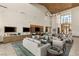 Comfortable lobby featuring plush seating, modern decor, and multiple entertainment screens, perfect for relaxation and socializing at 10179 Emerald Sunset Ct, Las Vegas, NV 89148