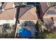 Aerial view of the backyard oasis with a pool, patio, and privacy at 10273 Grecian Laurel Ct, Las Vegas, NV 89183