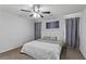 Inviting bedroom with neutral decor, plush carpet, and a relaxing atmosphere at 10273 Grecian Laurel Ct, Las Vegas, NV 89183