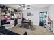 Spacious bedroom featuring an enormous walk-in closet, ceiling fan, desk, and comfortable seating at 10273 Grecian Laurel Ct, Las Vegas, NV 89183