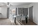 Dining area with backyard views and ceiling fan at 10273 Grecian Laurel Ct, Las Vegas, NV 89183