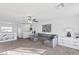 Open-concept living area with modern decor, comfortable seating, and lots of natural light at 10273 Grecian Laurel Ct, Las Vegas, NV 89183