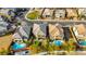 Aerial view showing backyards, pools, and surrounding houses in neighborhood at 10313 Aragon Crown Rd, Las Vegas, NV 89135