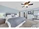 Comfortable bedroom with carpet, ceiling fan, and ensuite bathroom at 10313 Aragon Crown Rd, Las Vegas, NV 89135