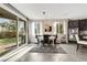 Charming dining area with sliding glass doors to the patio, providing a seamless indoor-outdoor flow at 10313 Aragon Crown Rd, Las Vegas, NV 89135