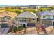 A beautiful two-story home with a paved driveway and desert landscaping at 10313 Aragon Crown Rd, Las Vegas, NV 89135