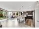 Spacious eat-in kitchen featuring an island with seating, stainless appliances, and a breakfast nook at 10313 Aragon Crown Rd, Las Vegas, NV 89135