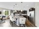Beautiful kitchen featuring an oversized island, stainless steel appliances, and ample counter space at 10313 Aragon Crown Rd, Las Vegas, NV 89135