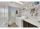 Well-organized laundry room with modern appliances and storage shelves at 10313 Aragon Crown Rd, Las Vegas, NV 89135