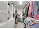 Spacious walk-in closet with custom shelving and ample storage for clothing at 10313 Aragon Crown Rd, Las Vegas, NV 89135