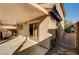 Covered patio with access to home and a gated side yard at 11147 Verismo St, Las Vegas, NV 89141