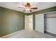 Inviting bedroom features neutral walls, ceiling fan, and closet storage at 11147 Verismo St, Las Vegas, NV 89141